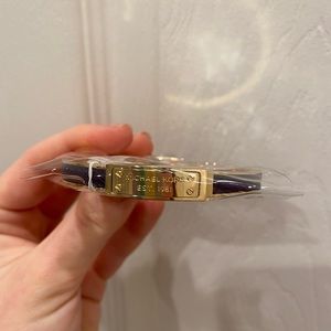 NWT Micheal Kors Bracelet - purple leather with gold trim